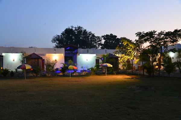 Lawn and cottages at dusk