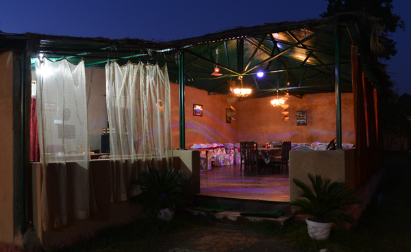 Dining pavilion lit up at night