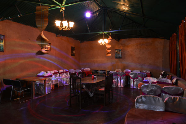 Dining pavilion set for an evening event