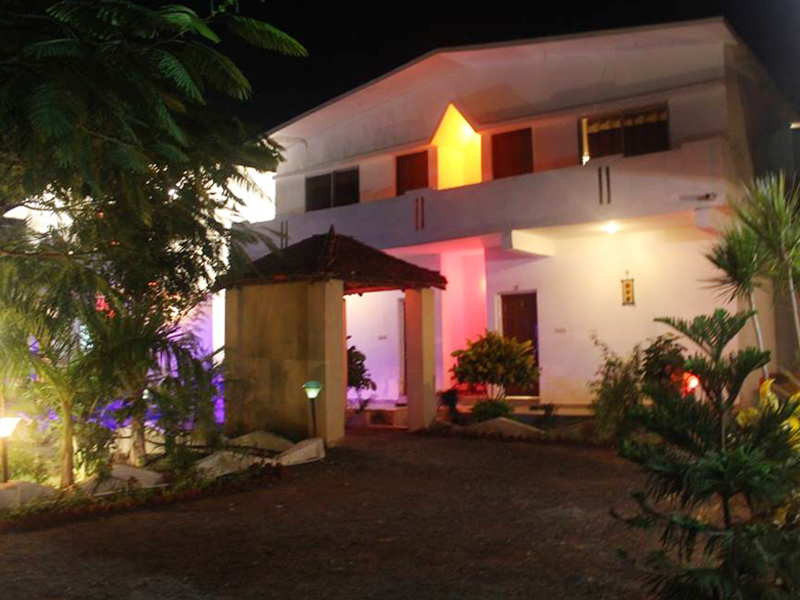 Resort building lit up in the evening