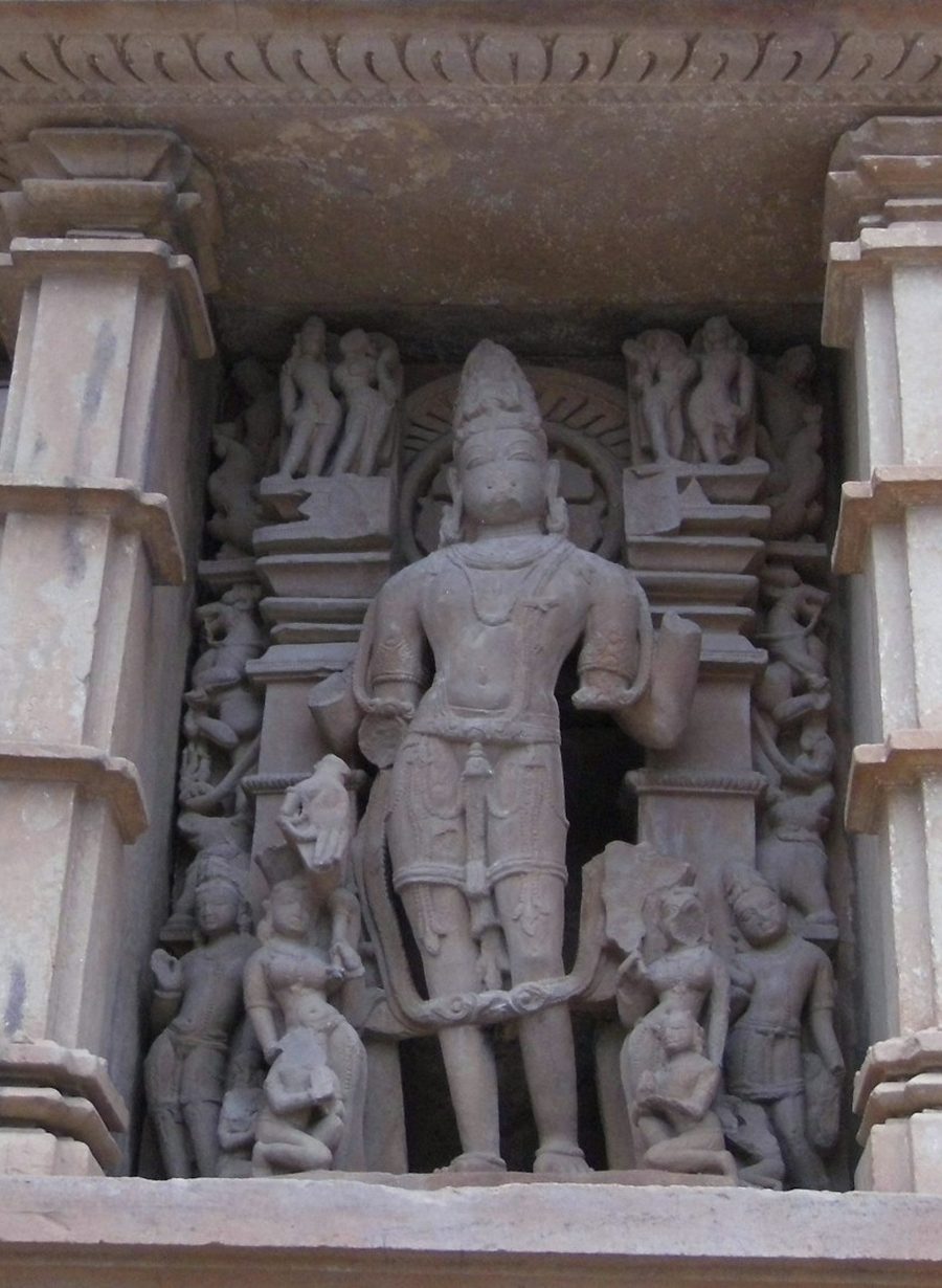 Carved sandstone sculptures on a Khajuraho temple wall